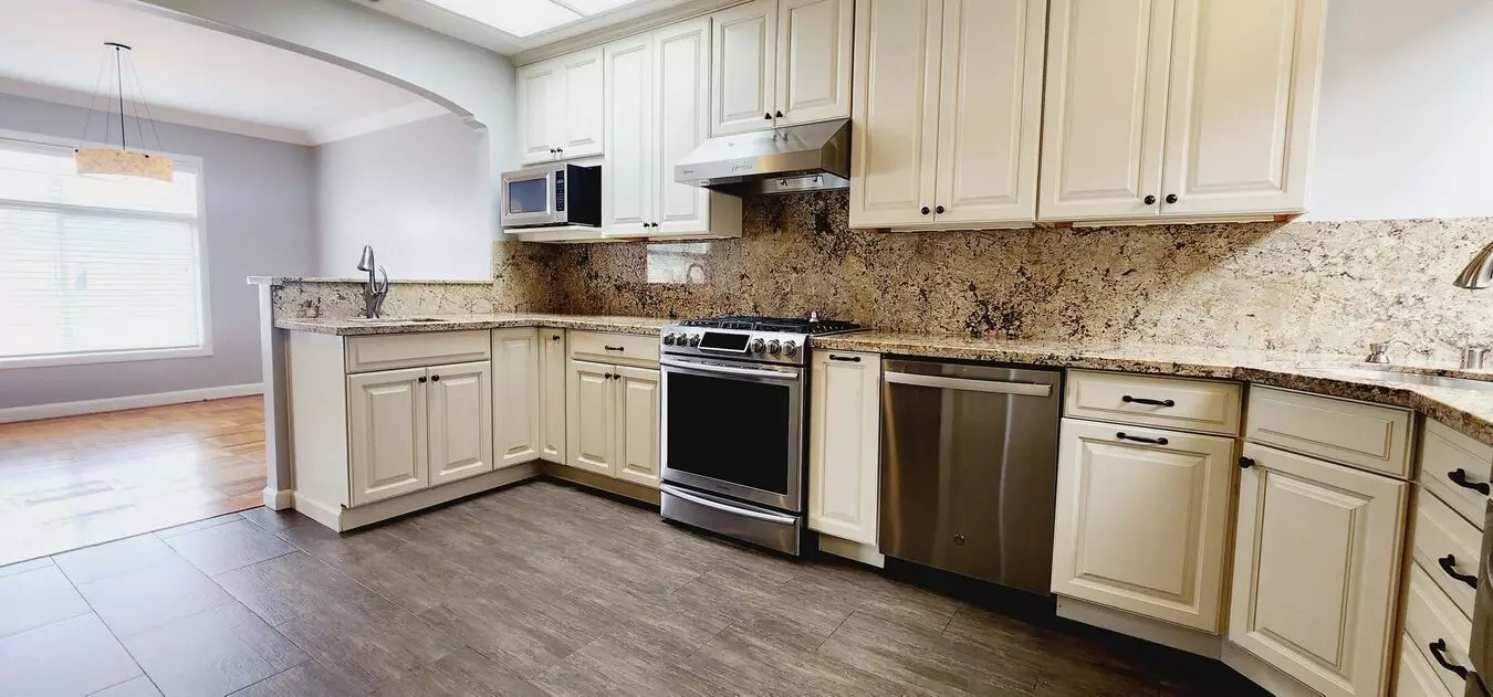 BEAUTIFULLY UPDATED SINGLE FAMILY HOME WITH BONUS ROOMS